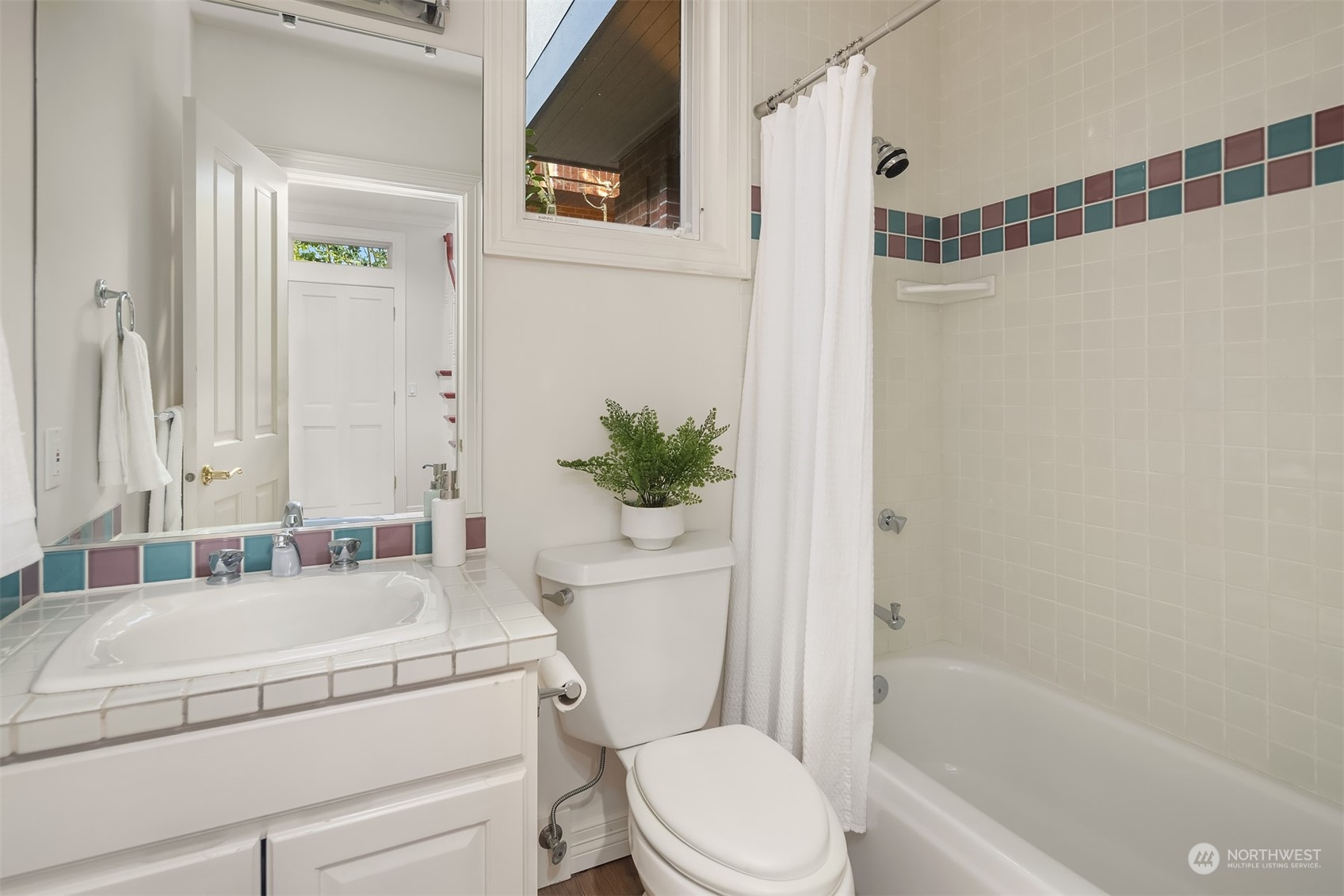 4452 Ferncroft Road Mercer Island, WA 98040 - Photo 34 of 39 a bathroom with a sink toilet and shower
