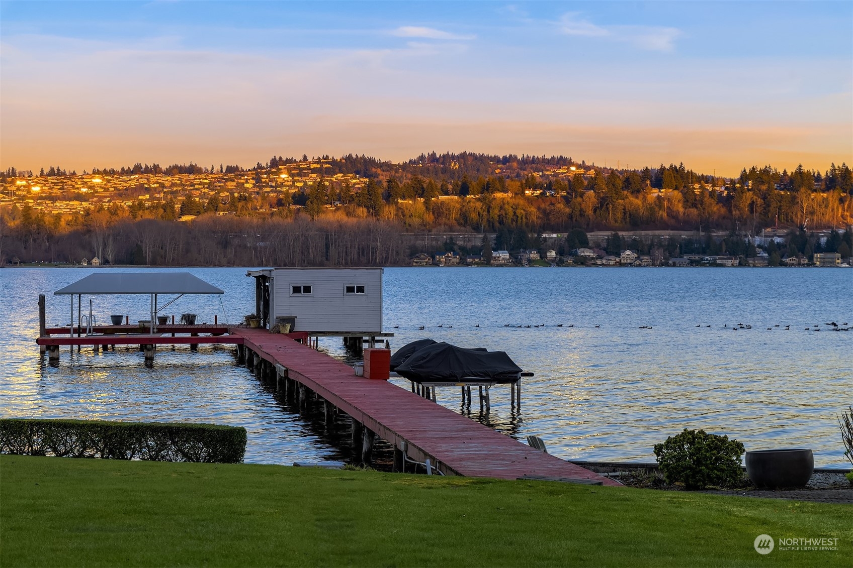 4452 Ferncroft Road Mercer Island, WA 98040 - Photo 39 of 39 a view of a lake with a yard and mountain view