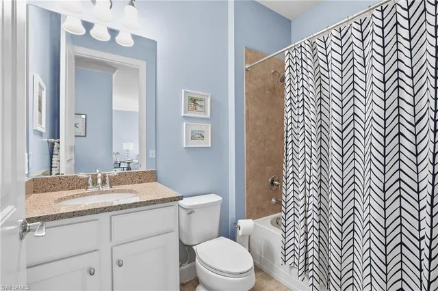 a living room with a couch and a table