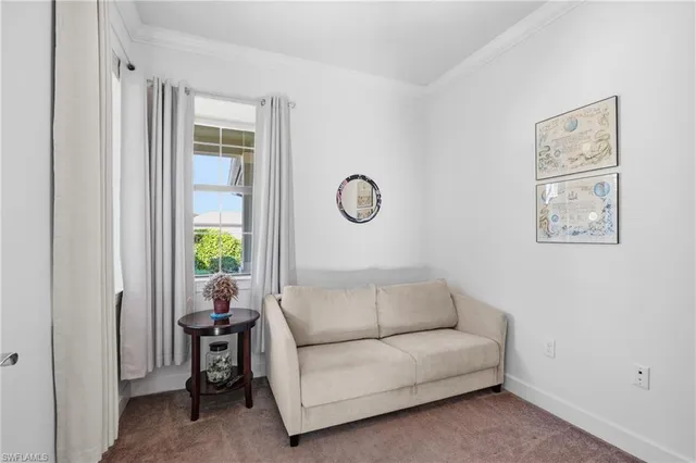 an aerial view of a house with a swimming pool outdoor seating and yard