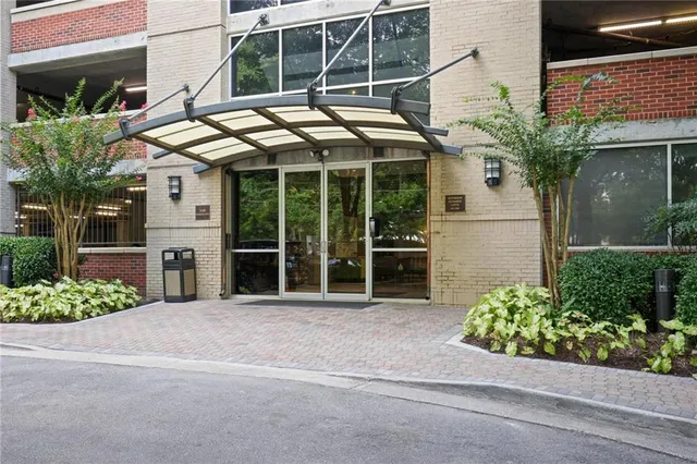 a view of a building with a street