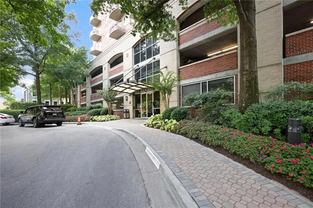 a view of a backyard with furniture