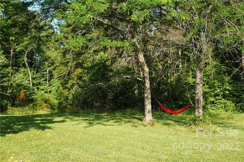 516 Starview Drive Rutherfordton, NC 28139 - Photo 17 of 47 a backyard of a house with lots of green space
