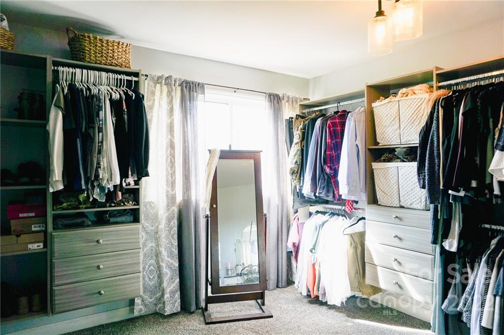 516 Starview Drive Rutherfordton, NC 28139 - Photo 35 of 47 a view of walk in closet with clothes