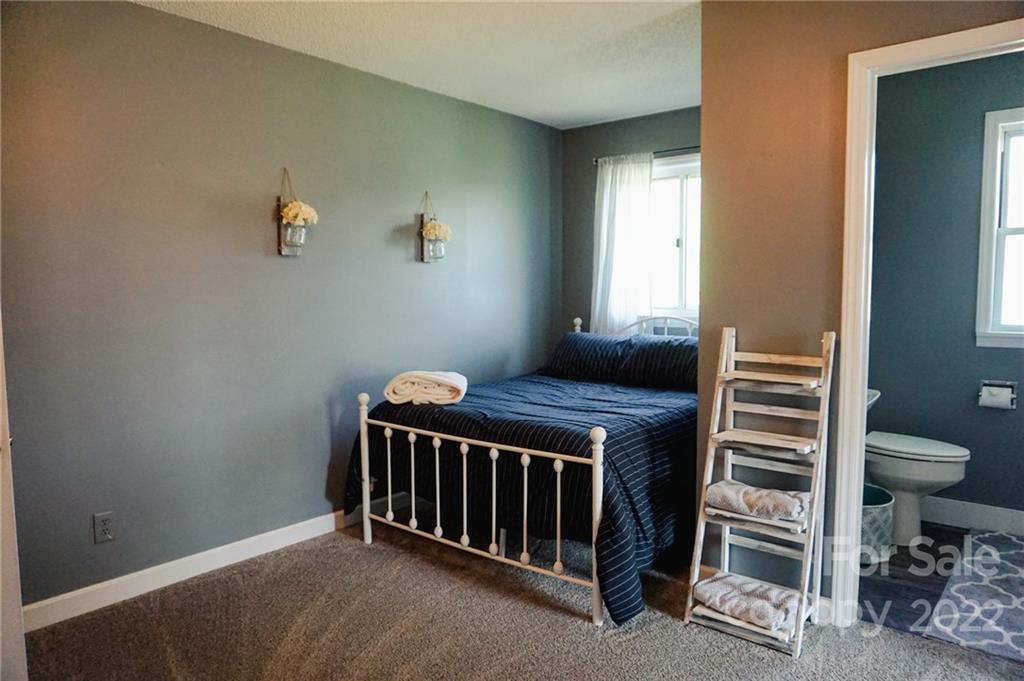 516 Starview Drive Rutherfordton, NC 28139 - Photo 40 of 47 a bedroom with a bed and a window
