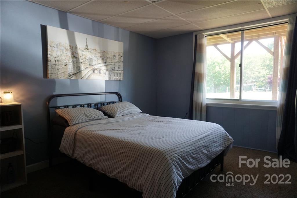 516 Starview Drive Rutherfordton, NC 28139 - Photo 46 of 47 a bedroom with a bed and a window
