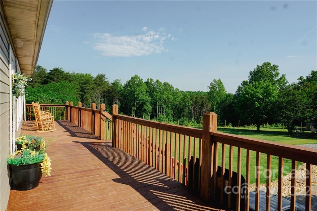 516 Starview Drive Rutherfordton, NC 28139 - Photo 5 of 47 a view of a balcony with wooden floor and outdoor space