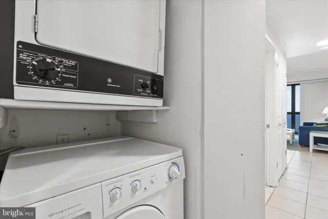 a view of a balcony with a yard