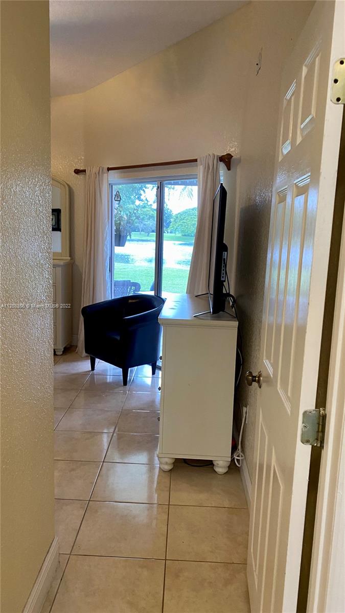 20309 Southwest 86th Court Cutler Bay, FL 33189 - Photo 34 of 59 a view of a kitchen with furniture and a window