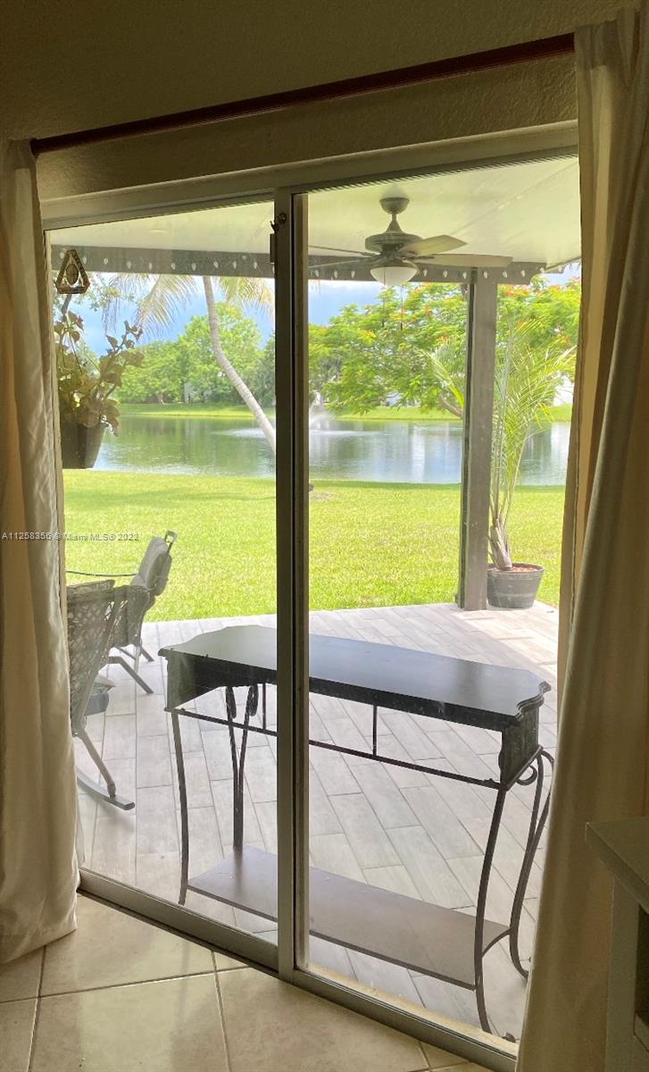 20309 Southwest 86th Court Cutler Bay, FL 33189 - Photo 38 of 59 a view of a glass door with a large window