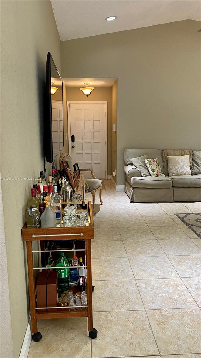 20309 Southwest 86th Court Cutler Bay, FL 33189 - Photo 6 of 59 a living room with furniture and a potted plant