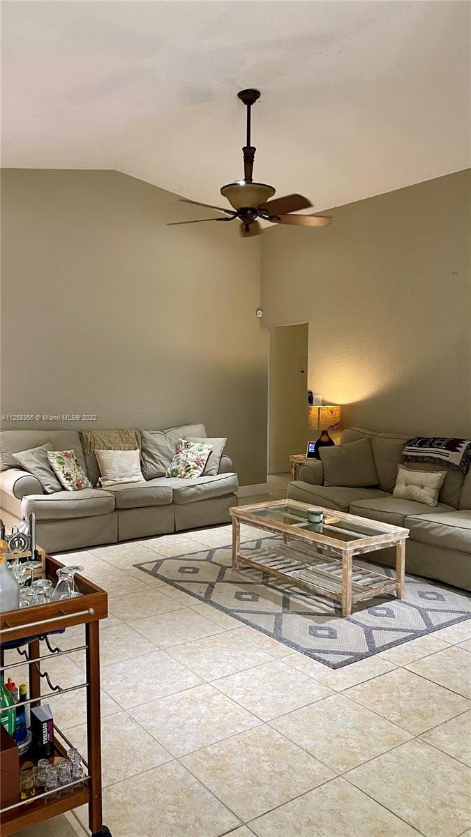 20309 Southwest 86th Court Cutler Bay, FL 33189 - Photo 7 of 59 a living room with furniture
