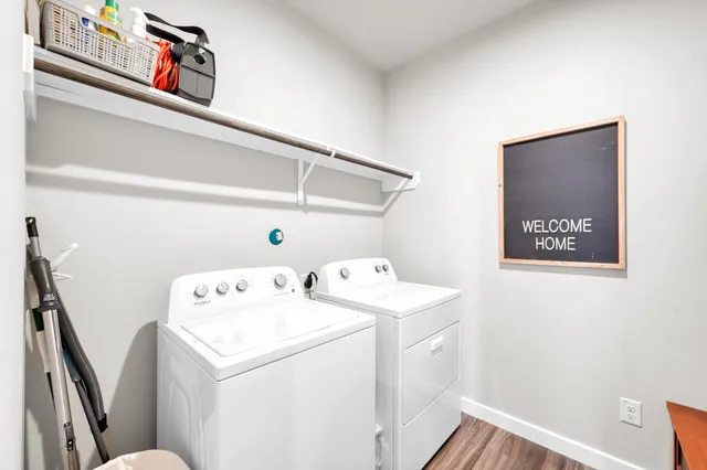a utility room with dryer and washer