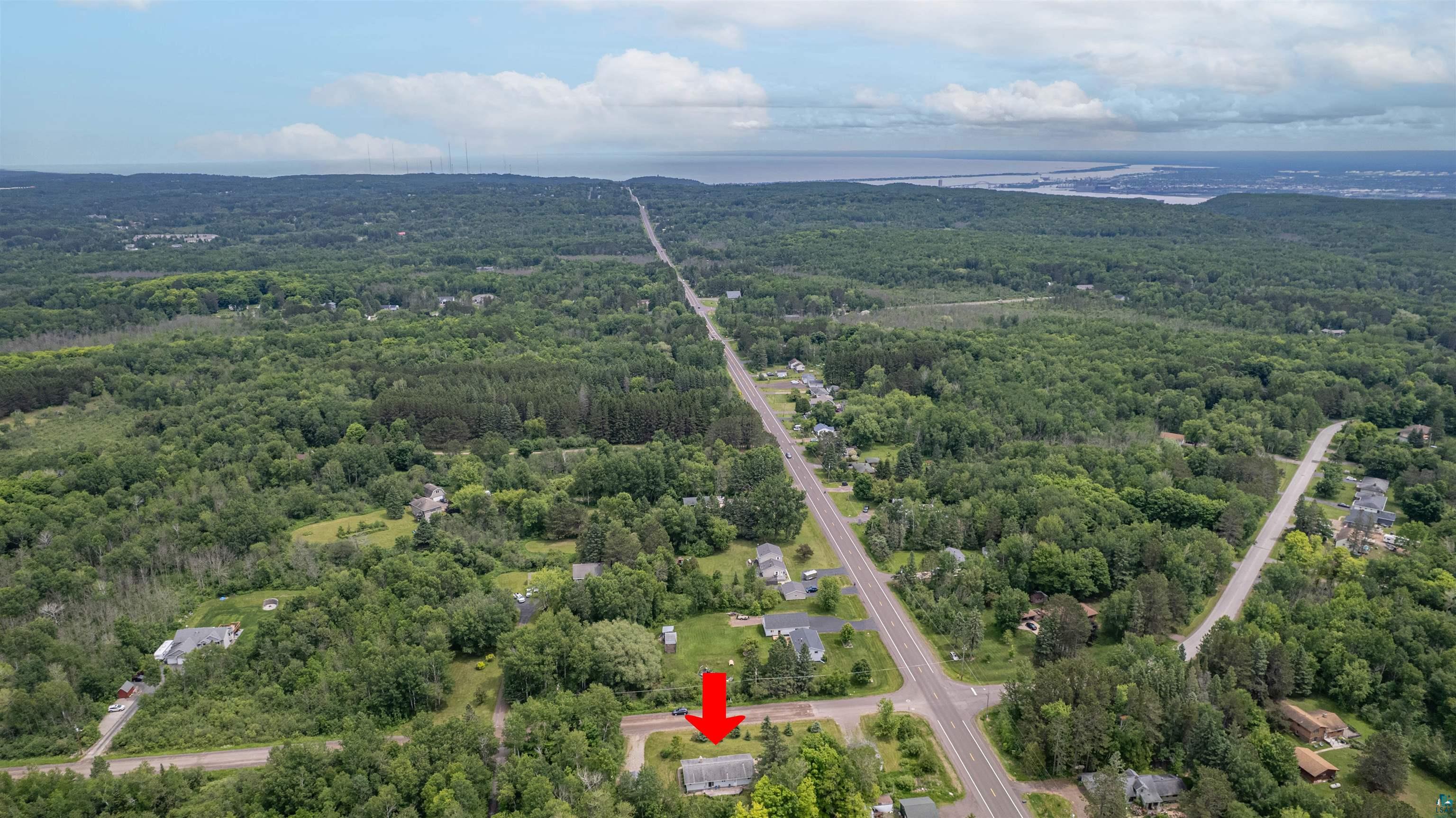 3711 Getchell Road Hermantown, MN 55811 - Photo 28 of 31 Aerial perspective highlighting the property amidst extensive surrounding trees