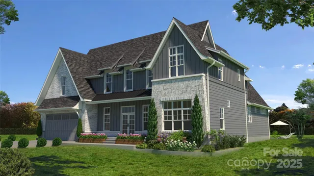 a view of a house with a swimming pool and a large tree