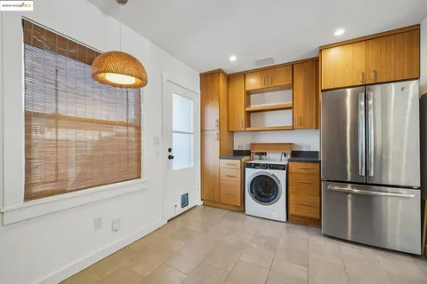 a view of kitchen with washer and dryer