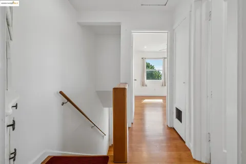 a view of hallway with stairs