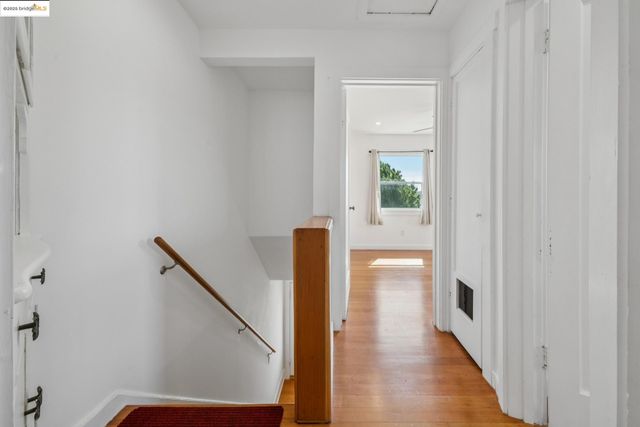 a view of hallway with stairs