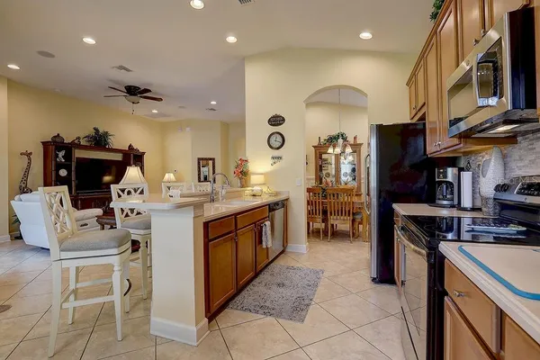 a large bathroom with a sink and a large mirror