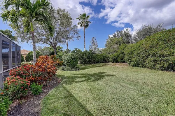 a view of a lake from a yard