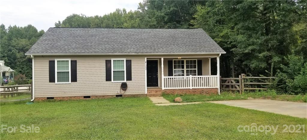 1202 West Rebound Road Lancaster, SC 29720 - Photo 1 of 14 a house that has a big yard in front of it