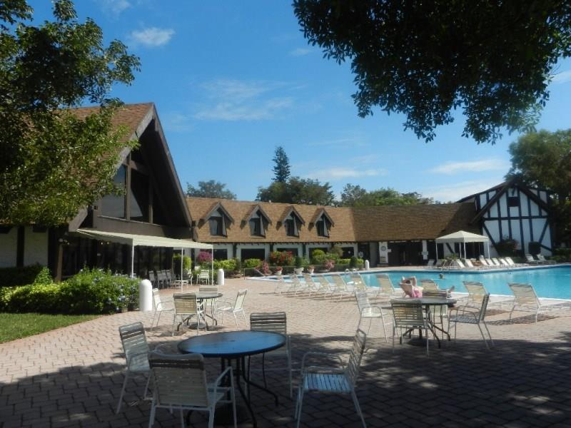 3760 Inverrary Drive, Unit 2H Lauderhill, FL 33319 - Photo 14 of 23 a view of house with yard and sitting area