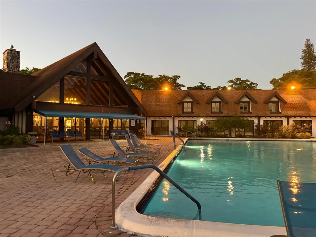 3760 Inverrary Drive, Unit 2H Lauderhill, FL 33319 - Photo 23 of 23 a view of a lake with couches chairs