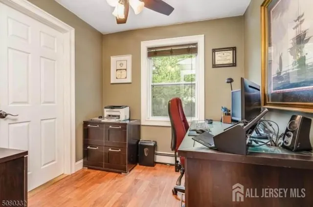 a workspace with furniture and window