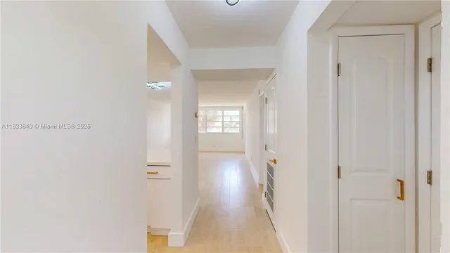 a kitchen with stainless steel appliances a refrigerator sink and stove