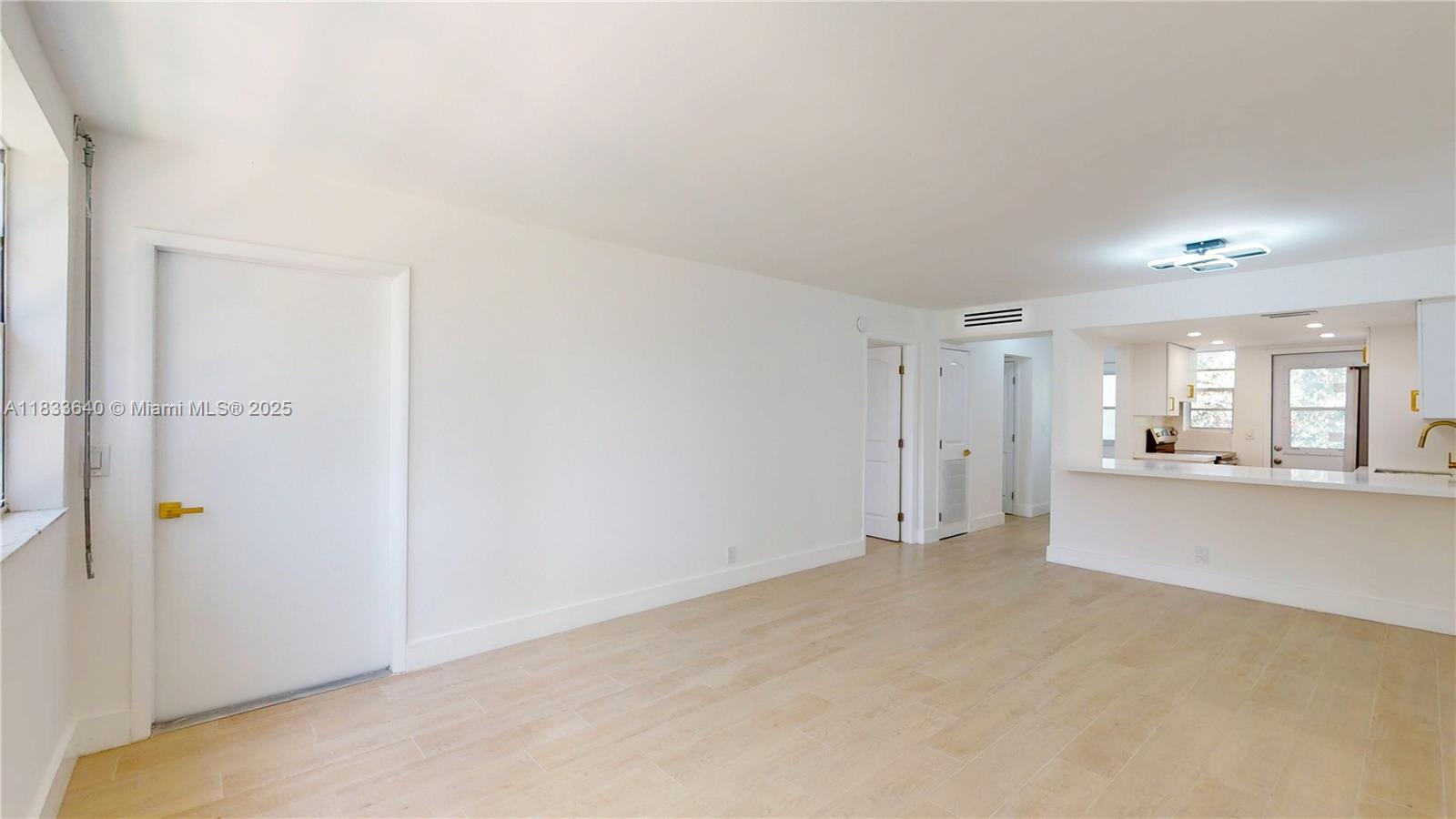 1333 East Hallandale Beach Boulevard, Unit 326 Hallandale Beach, FL 33009 - Photo 2 of 38 a view of an empty room