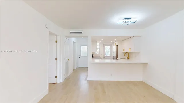 a bathroom with a sink a toilet and a bathtub
