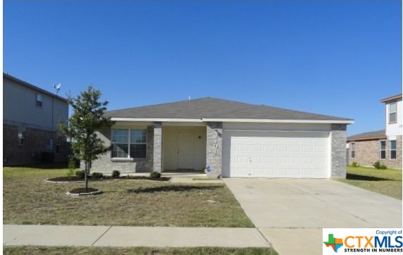 2401 Eppinette Drive Killeen, TX 76542 - Photo 1 of 1 a front view of a house with garden