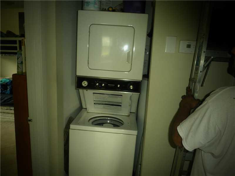 6401 Dockside Circle, Unit 6401 Greenacres, FL 33463 - Photo 3 of 3 Utility Room.