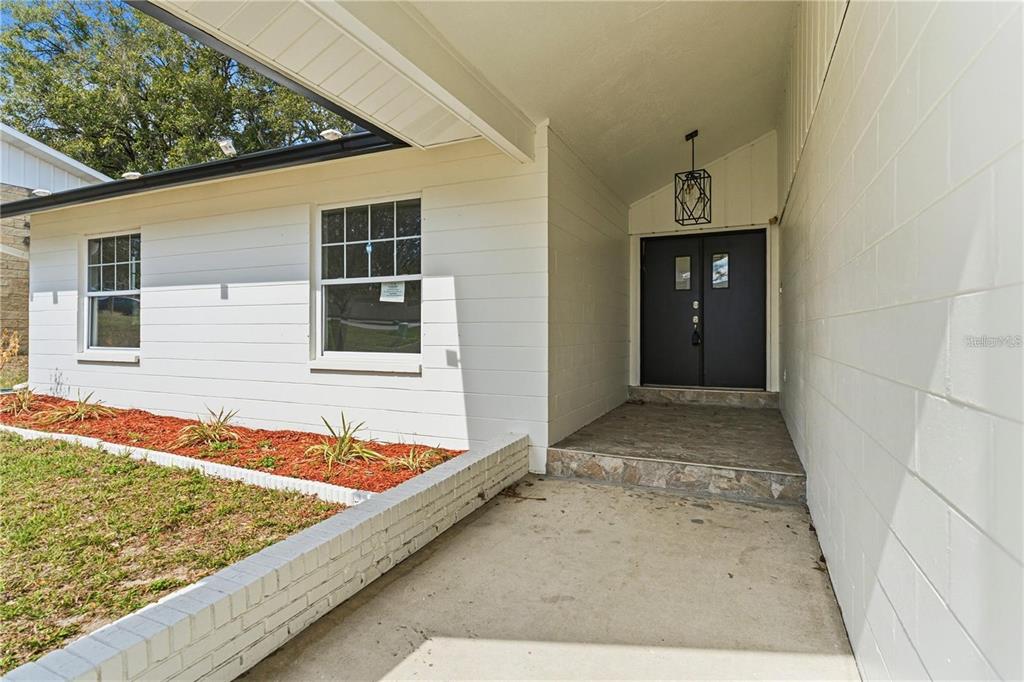 616 Water Road Ocala, FL 34472 - Photo 2 of 32 a view of backyard of the house