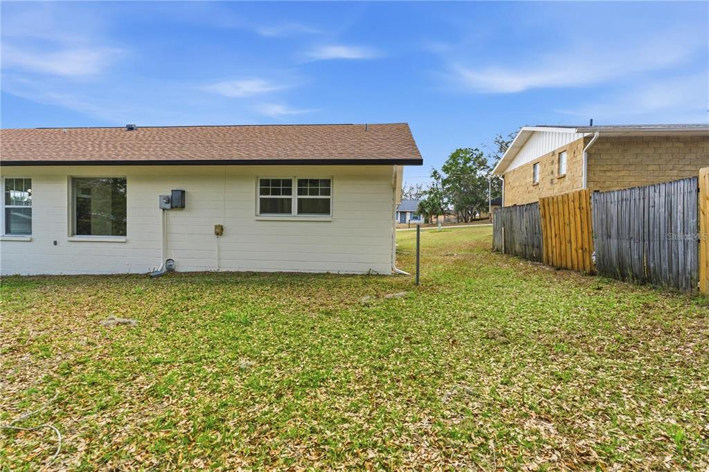 616 Water Road Ocala, FL 34472 - Photo 29 of 32 a view of a backyard