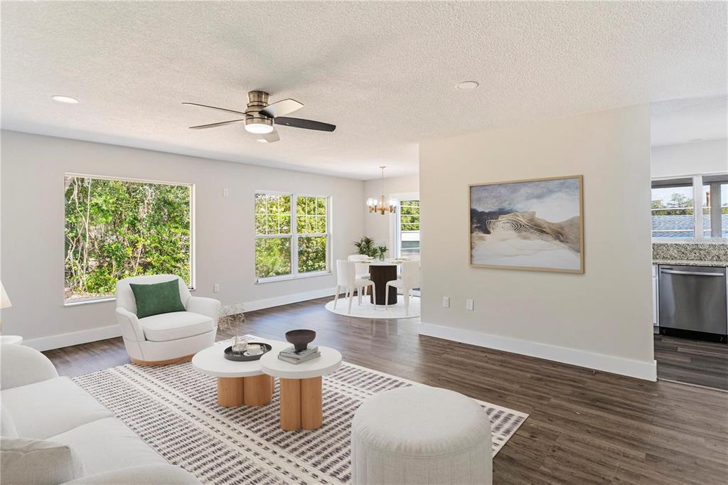616 Water Road Ocala, FL 34472 - Photo 5 of 32 a living room with furniture and a large window