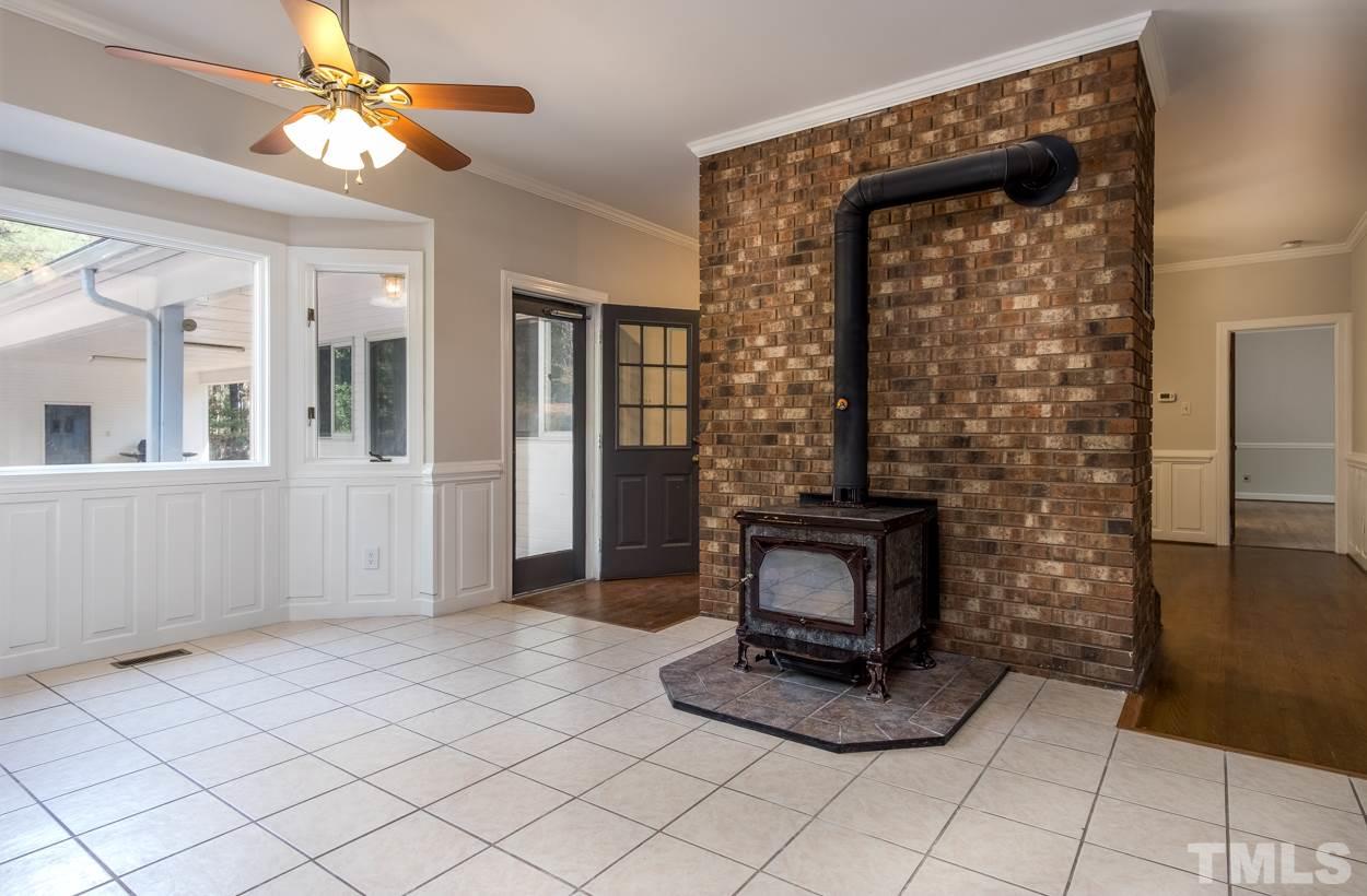 1205 Little Creek Road Durham, NC 27713 - Photo 7 of 22 Large breakfast area with woodstove