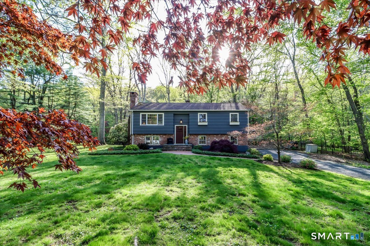 28 Fieldcrest Drive Ridgefield, CT 06877 - Photo 1 of 36 a view of a house with a backyard