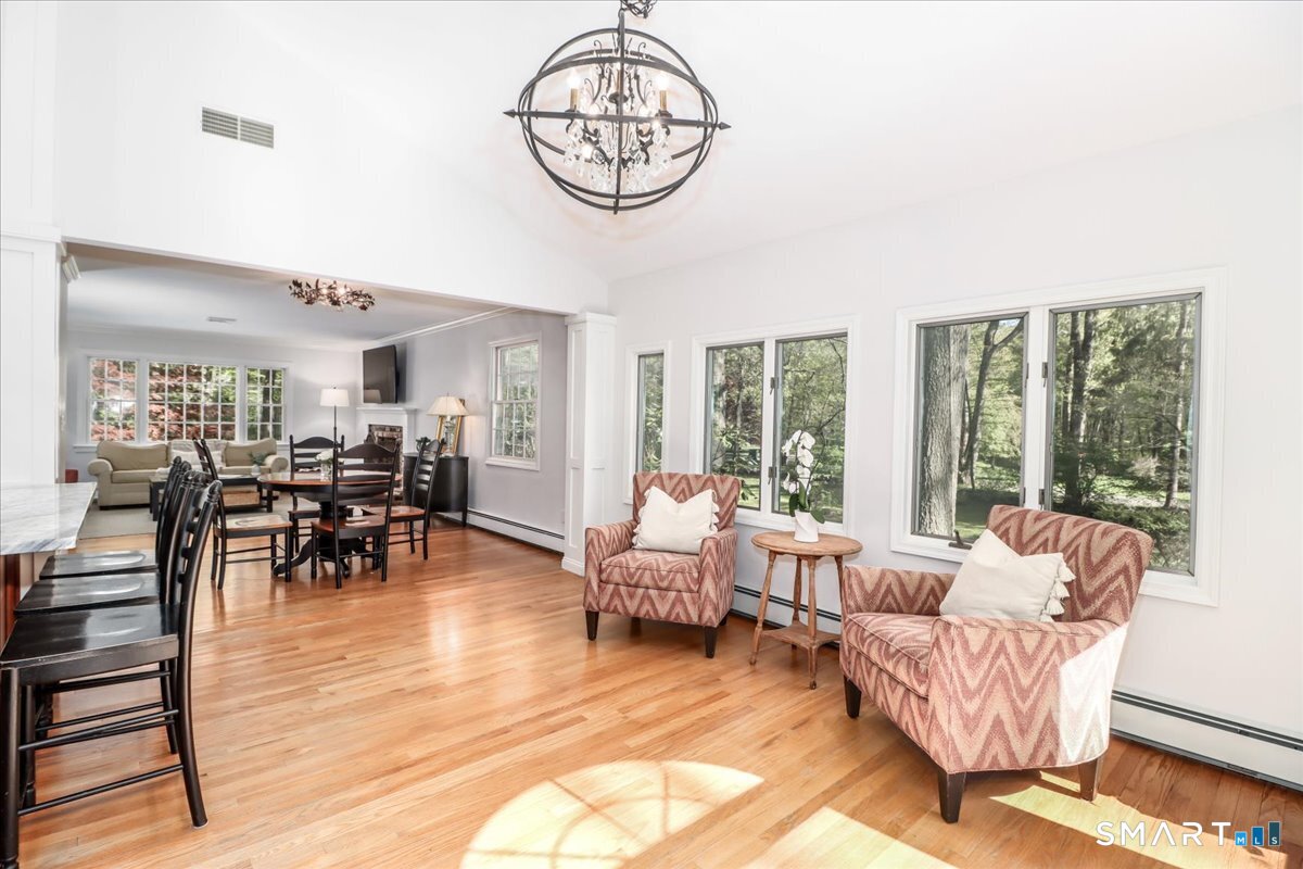 28 Fieldcrest Drive Ridgefield, CT 06877 - Photo 13 of 36 a living room with furniture and a large window