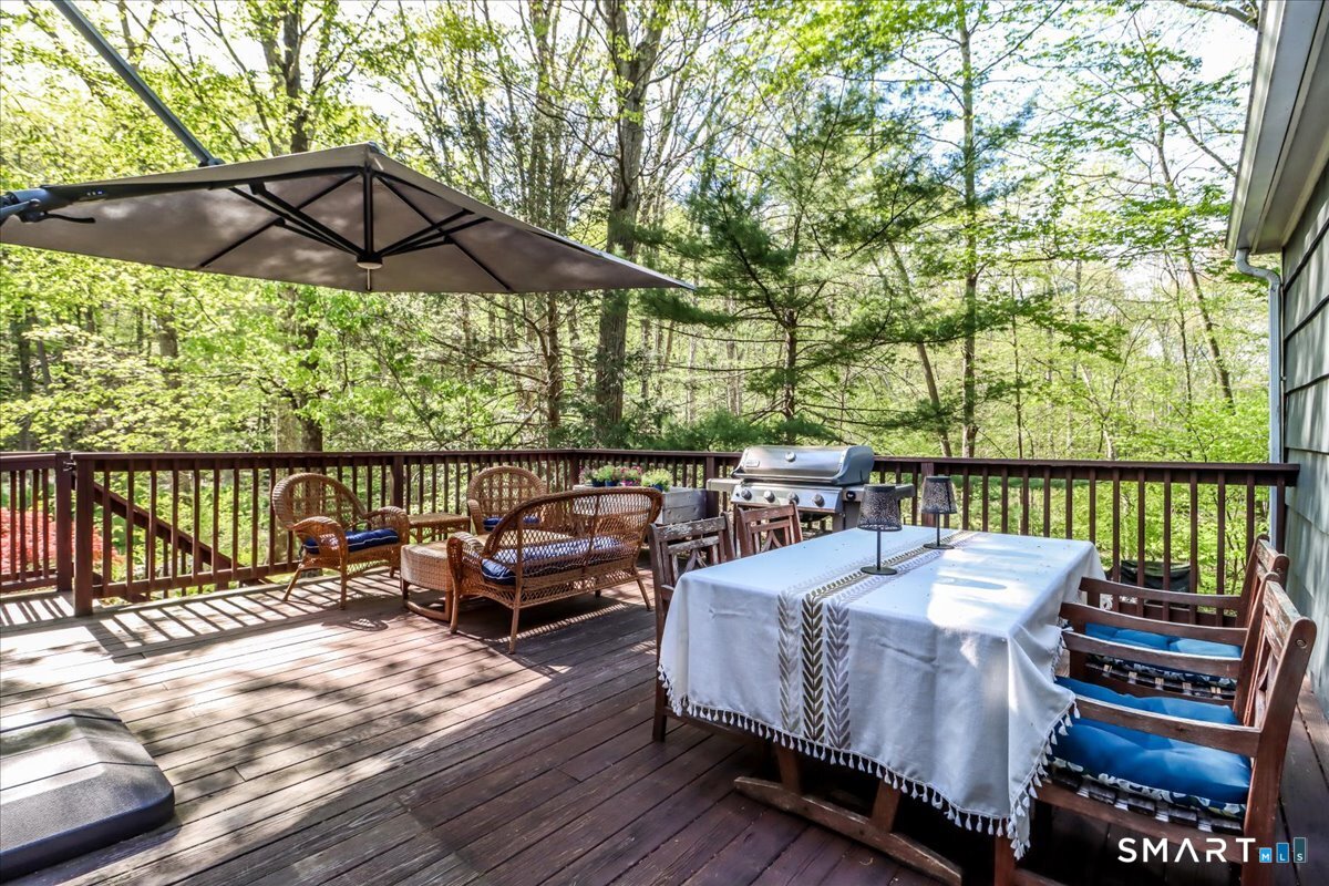 28 Fieldcrest Drive Ridgefield, CT 06877 - Photo 26 of 36 a terrace view with sitting space and outdoor seating