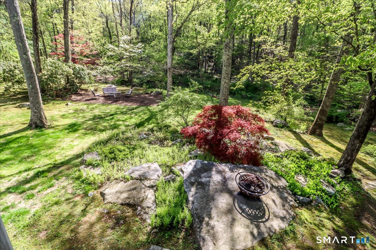 28 Fieldcrest Drive Ridgefield, CT 06877 - Photo 30 of 36 a view of a garden with plants