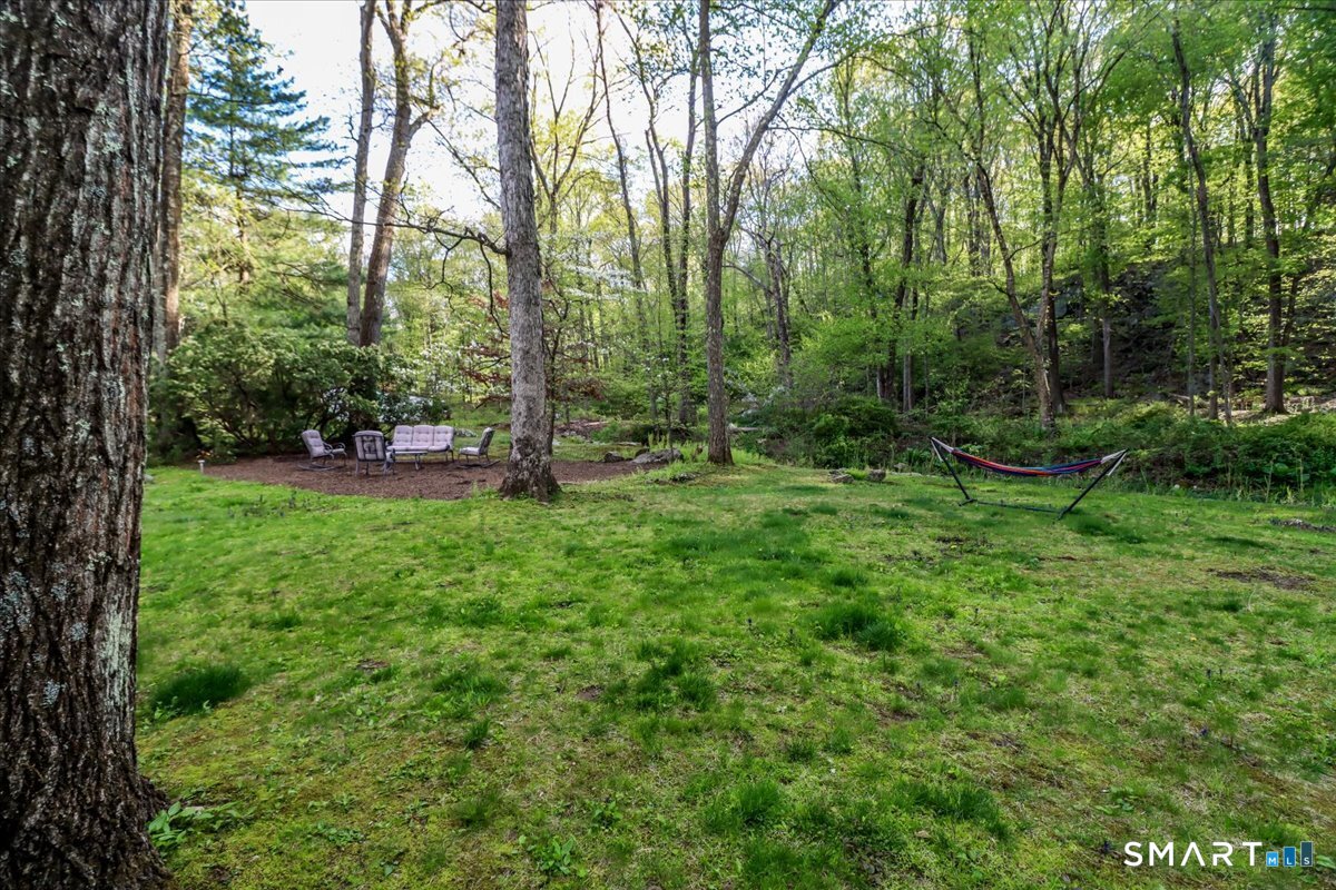 28 Fieldcrest Drive Ridgefield, CT 06877 - Photo 31 of 36 a view of outdoor space with deck and yard