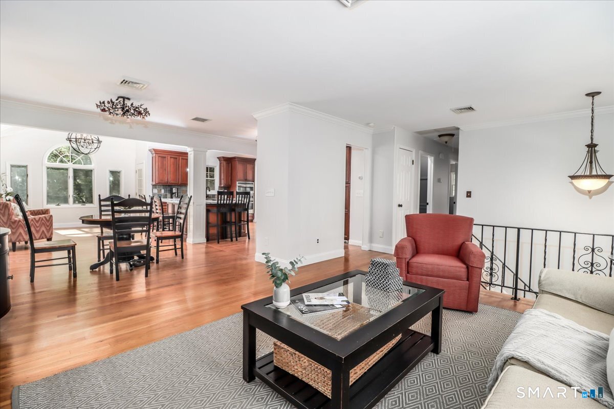 28 Fieldcrest Drive Ridgefield, CT 06877 - Photo 6 of 36 a living room with furniture and wooden floor