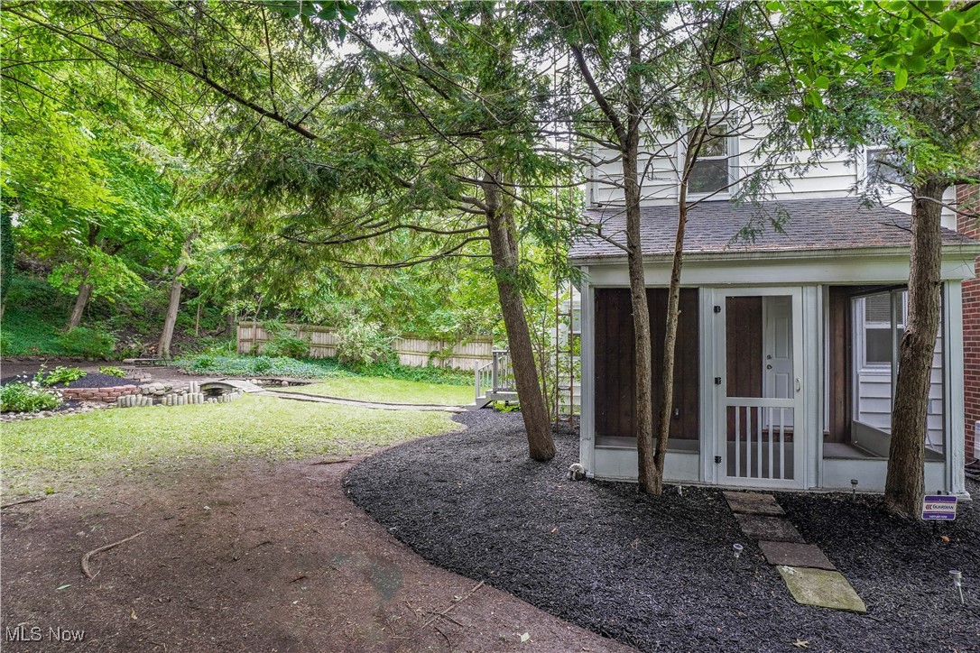 1822 Monument Road Northwest Canton, OH 44709 - Photo 31 of 36 Side View with Enclosed Patio