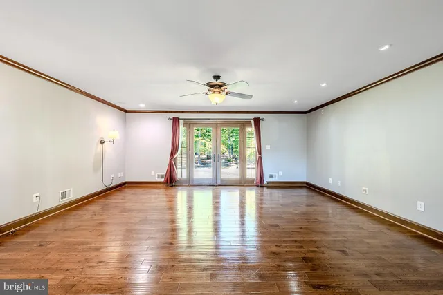 a kitchen with kitchen island a counter top space appliances and a center island