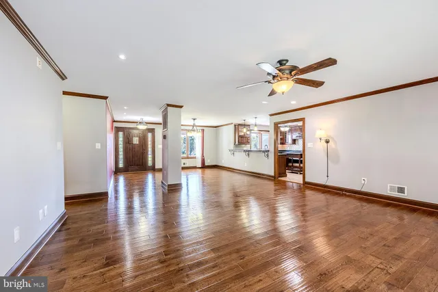 a kitchen with a stove a sink and a refrigerator