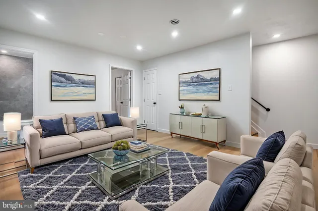 a living room with furniture and a couch