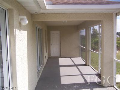 514 Raintree Street East Lehigh Acres, FL 33974 - Photo 9 of 10 a view of a balcony