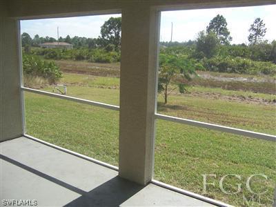514 Raintree Street East Lehigh Acres, FL 33974 - Photo 10 of 10 a view of a lot of a window