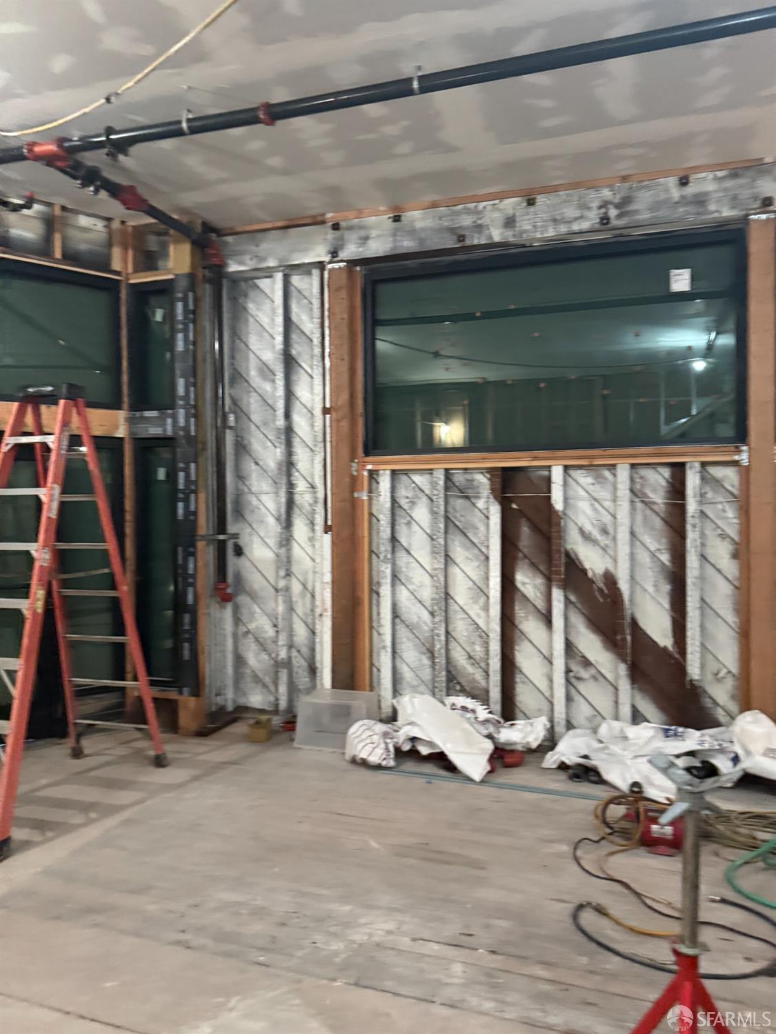 2403 16th Street San Francisco, CA 94110 - Photo 23 of 30 a view of a room with gym equipment